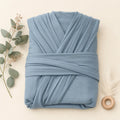 Bluebell Jersey Wrap arranged as a clean baby shower product photo