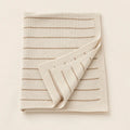 Cedar Stripe Baby Throw arranged as a clean baby shower product photo