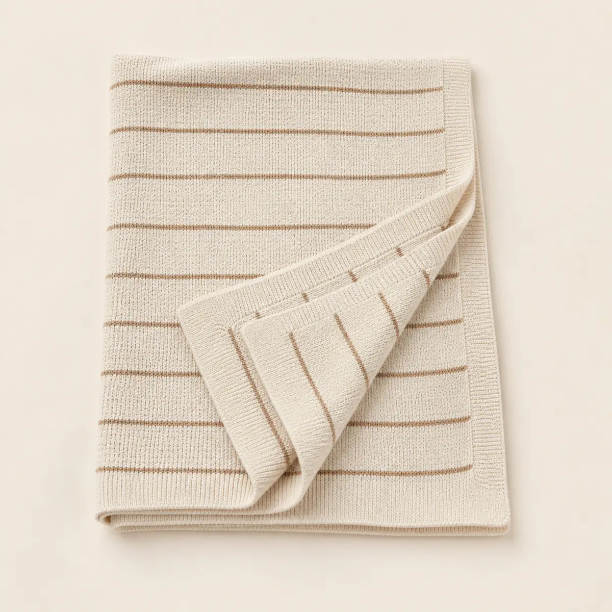 Cedar Stripe Baby Throw arranged as a clean baby shower product photo