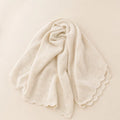 Cloud-Knit Baby Blanket arranged as a clean baby shower product photo