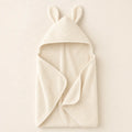 Hooded Bunny Towel arranged as a clean baby shower product photo