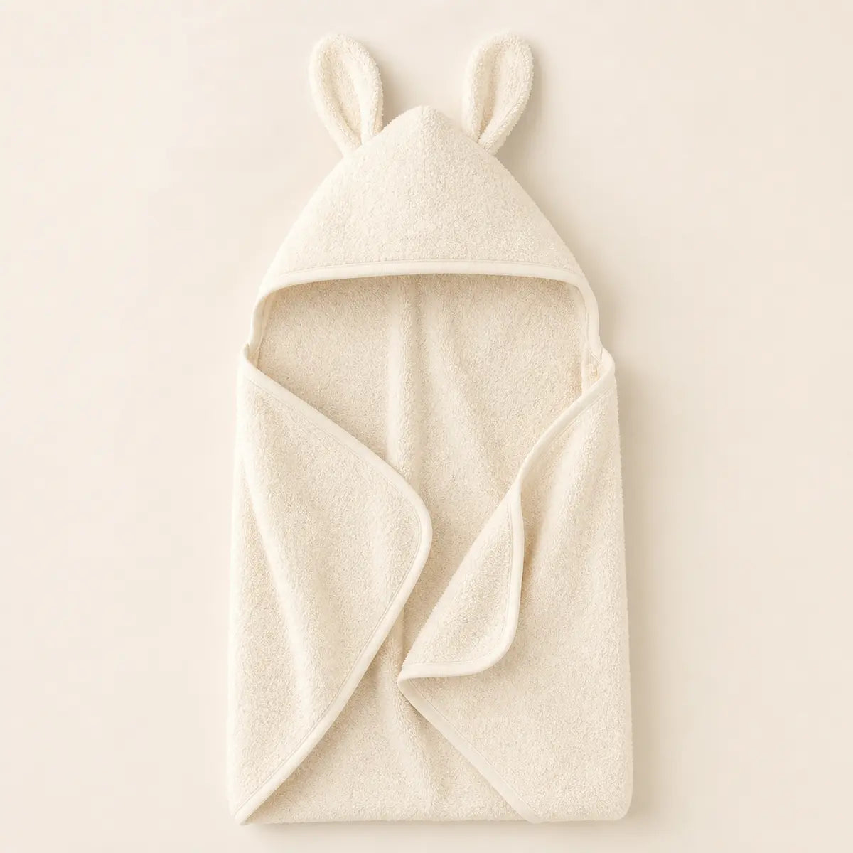 Hooded Bunny Towel arranged as a clean baby shower product photo