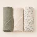 Meadow Muslin Swaddle Set arranged as a clean baby shower product photo