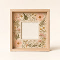 Pressed Flower Memory Frame arranged as a clean baby shower product photo