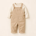 Tiny Explorer Overall Set arranged as a clean baby shower product photo