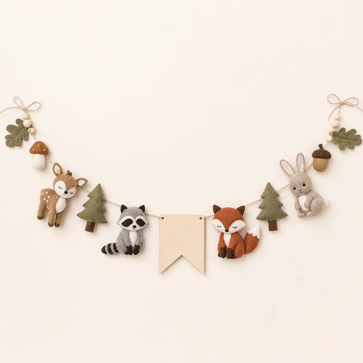 Woodland Name Garland arranged as a clean baby shower product photo